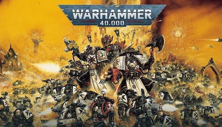 Warhammer 40,000 battle scene with space marines charging across a fiery, war-torn battlefield under a blue logo banner.