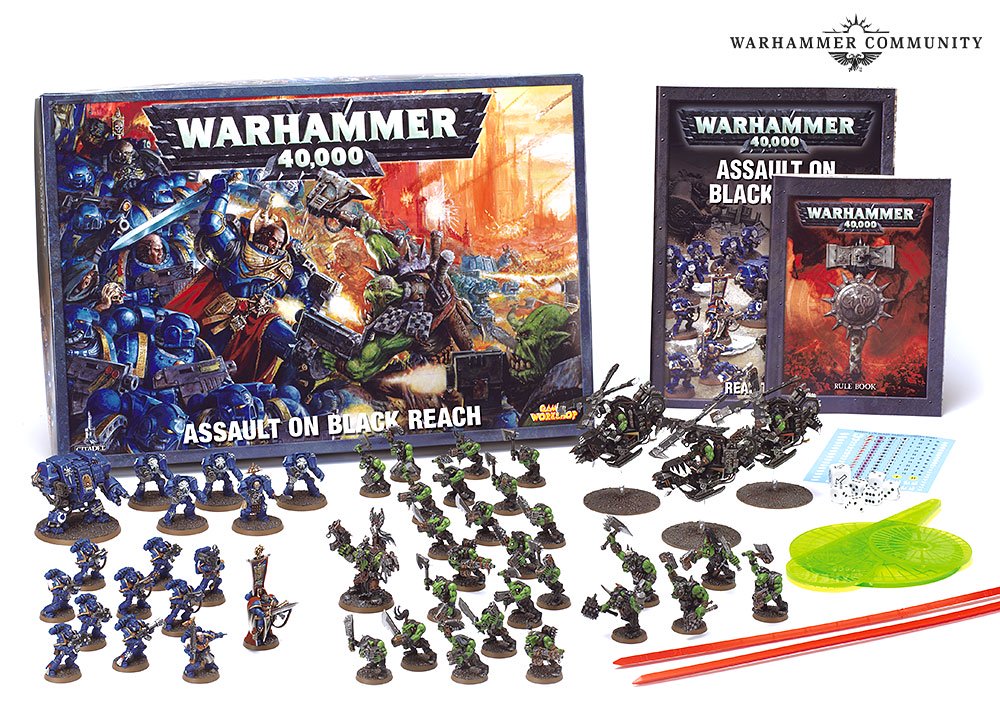 Warhammer 40,000 Assault on Black Reach starter set with miniature squads, rulebooks, bases, and dice.