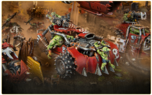 Green orc soldiers ride a red armored battle buggy with skull insignia, firing guns in a dusty battlefield.
