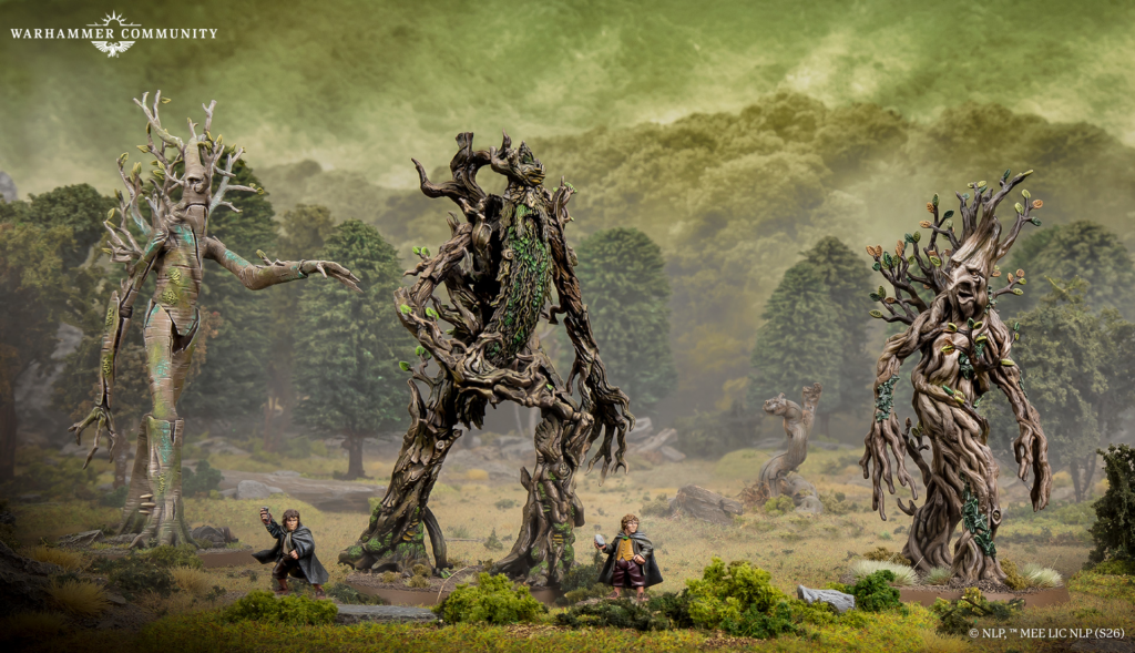 Warhammer Community header above a forest battlefield with three towering treelike monsters and several human miniatures in the foreground.