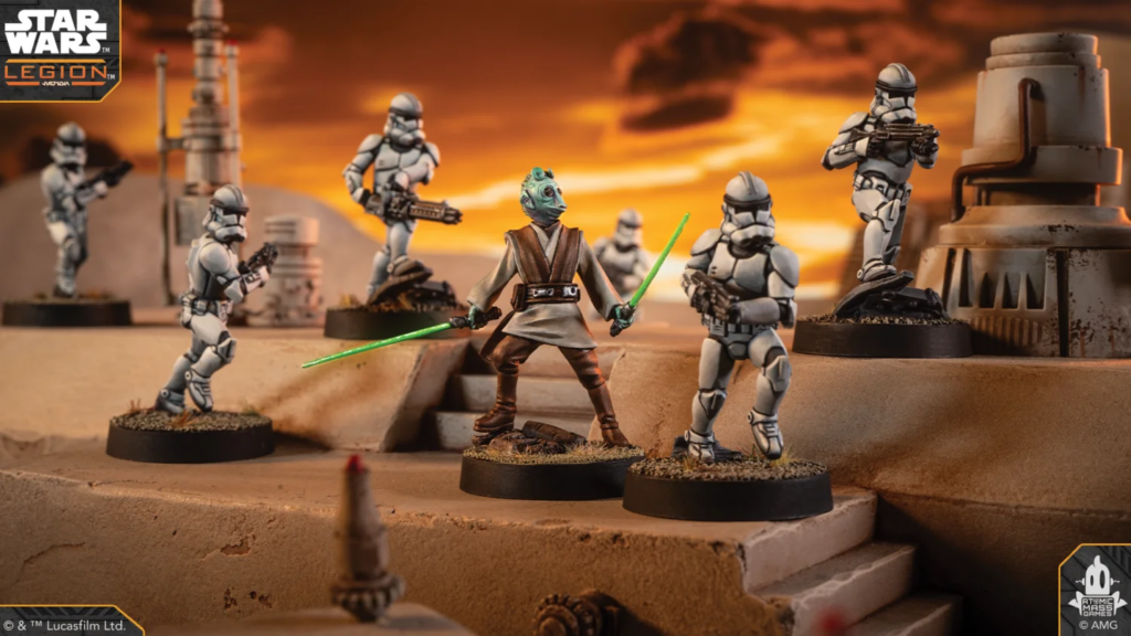 Central action figure wielding two green lightsabers battles a squad of white-clad clone troopers on a desert sci‑fi battlefield at sunset, with Star Wars: Legion branding in the corner