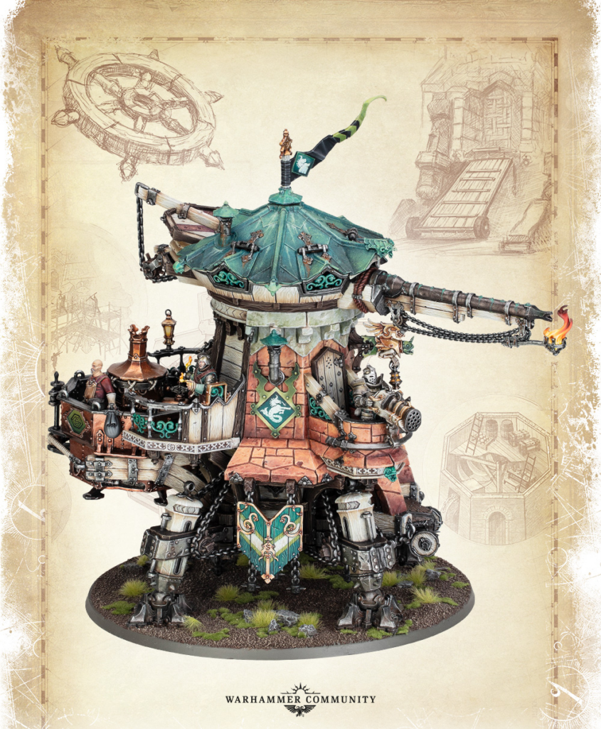 Painted Warhammer steam-tank fortress model with teal roof, cannons and armored crew on a textured grassy base.
