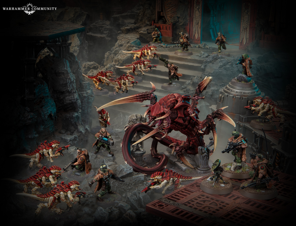 Warhammer miniature battle in a dark cavern: red dragon-like monsters swarm armored soldiers amid rocky ruins and blue-lit doors in the background.