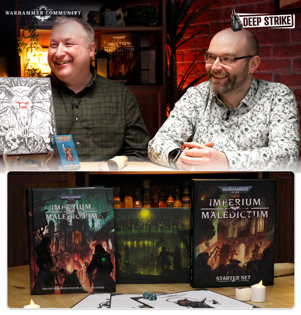 Two men smile at a table displaying Warhammer Imperium Maledictum starter sets and game accessories, with Warhammer Community and Deep Strike logos in frame