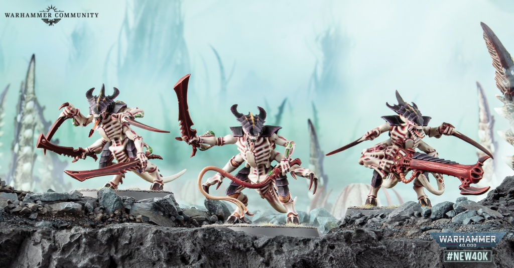 Three skeletal alien Warhammer miniatures with red bladed weapons on a rocky diorama, pale green misty battlefield behind them; Warhammer Community logo top-left.
