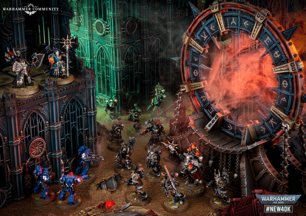 Diorama of a Warhammer 40,000 battle inside a gothic fortress; blue Space Marines clash with orcs near a large fiery circular portal.