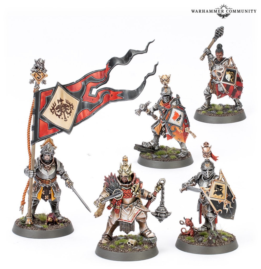 Six Warhammer fantasy miniatures: armored knights with shields and weapons, one bearing a large red-and-black banner, on textured bases.