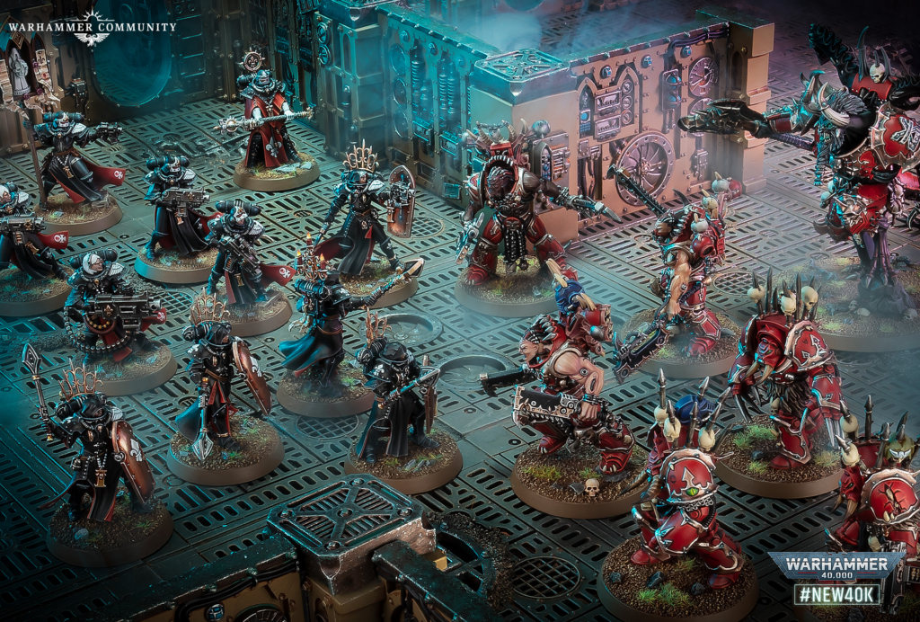 Warhammer 40K miniatures clash on a metallic sci‑fi board, with Space Marines and Chaos units in battle.