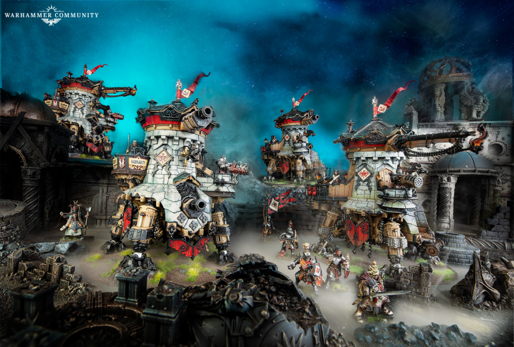 Warhammer miniatures battle scene with towering armored orks and ruined fortifications beneath a blue night sky, logo in top-left corner