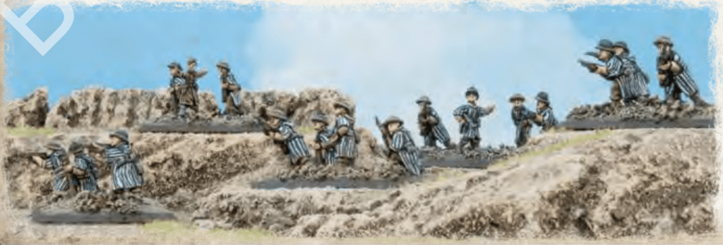 Diorama of toy soldiers in striped uniforms advancing across a dirt battlefield against a blue sky.
