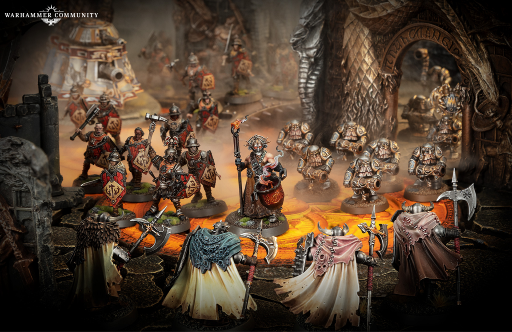 Tabletop Warhammer battle scene with armored infantry advancing toward a cloaked sorcerer at the center on a fiery, lava-lit board amidst ruined cavern walls.