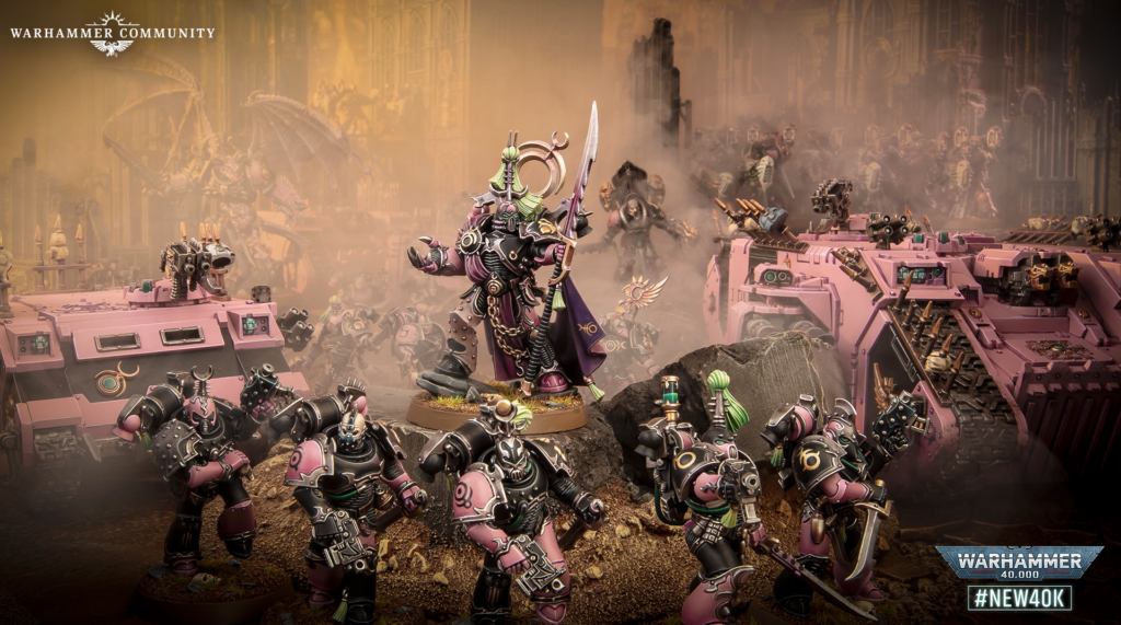 Central purple-armored commander with green accents and sword leads pink tanks and troops through a smoky battlefield; Warhammer Community logo at top-left.