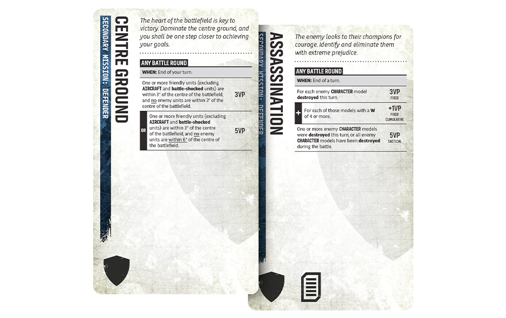 image Frontline Gaming Two overlapping parchment-style game cards, one labeled 'Centre Ground' and the other 'Assassination', each with small text blocks and icons (shield bottom left, document bottom right) suggesting battlefield mission cards.
