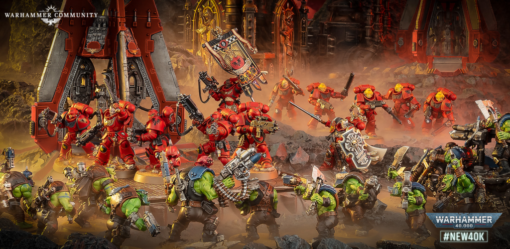 image Frontline Gaming Red-armored Space Marines clash with green orcs in a smoky, lava-lit battlefield amid towering war machines and ruins, with Warhammer branding visible in the corner.