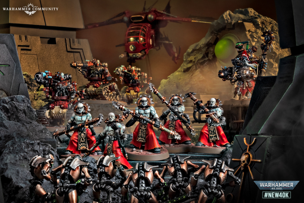 image Frontline Gaming Warhammer display: red-armored infantry clash in a rocky sci-fi battlefield beneath a hovering red helicopter.