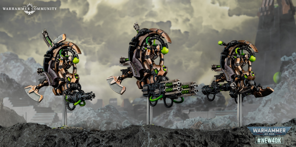 Three bronze-and-green Warhammer 40,000 machines hover on clear stands in a ruined landscape, with Warhammer Community logo in the top-left corner and #NEW40K at the bottom-right.