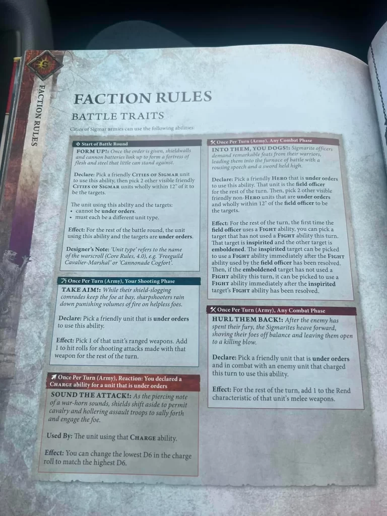 Page from a tabletop game rulebook showing Faction Rules: Battle Traits with sections like Start of Battle Round and Once Per Turn (Army).