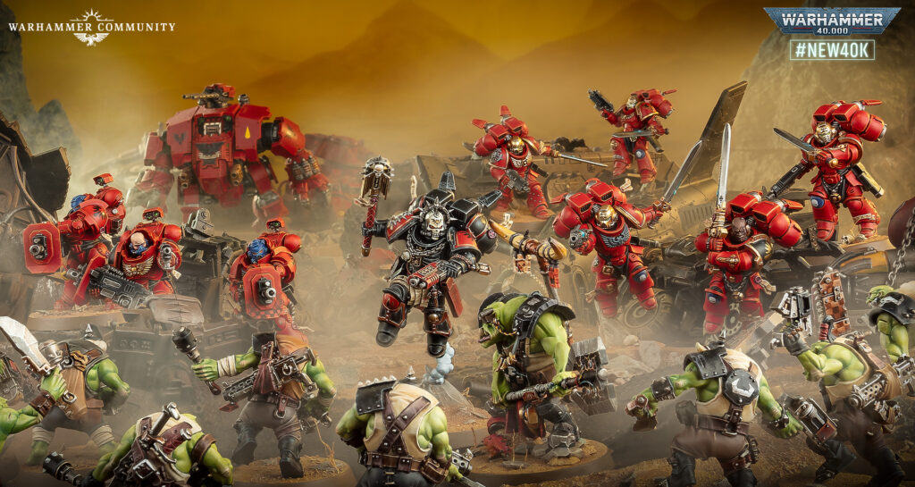 Horde of red-armored Space Marines clash with green Orcs on a dusty battlefield; Warhammer Community logo in the top corner.