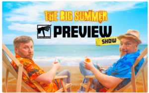 Two men in tropical shirts sit on beach chairs with drinks, under a bright blue sky, beside the title The Big Summer Preview Show and a Warhammer logo.