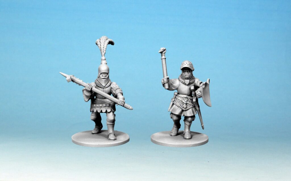 Two gray medieval knight figurines standing on circular bases against a blue gradient backdrop, one with a long spear and the other with a mace and shield.
