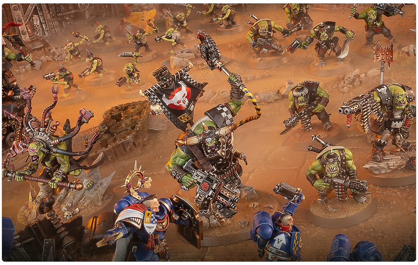 Screenshot 20260710 121108 Frontline Gaming Tabletop battle scene with green orc warriors clashing with armored space marines on a dusty battlefield central orc bearing a banner