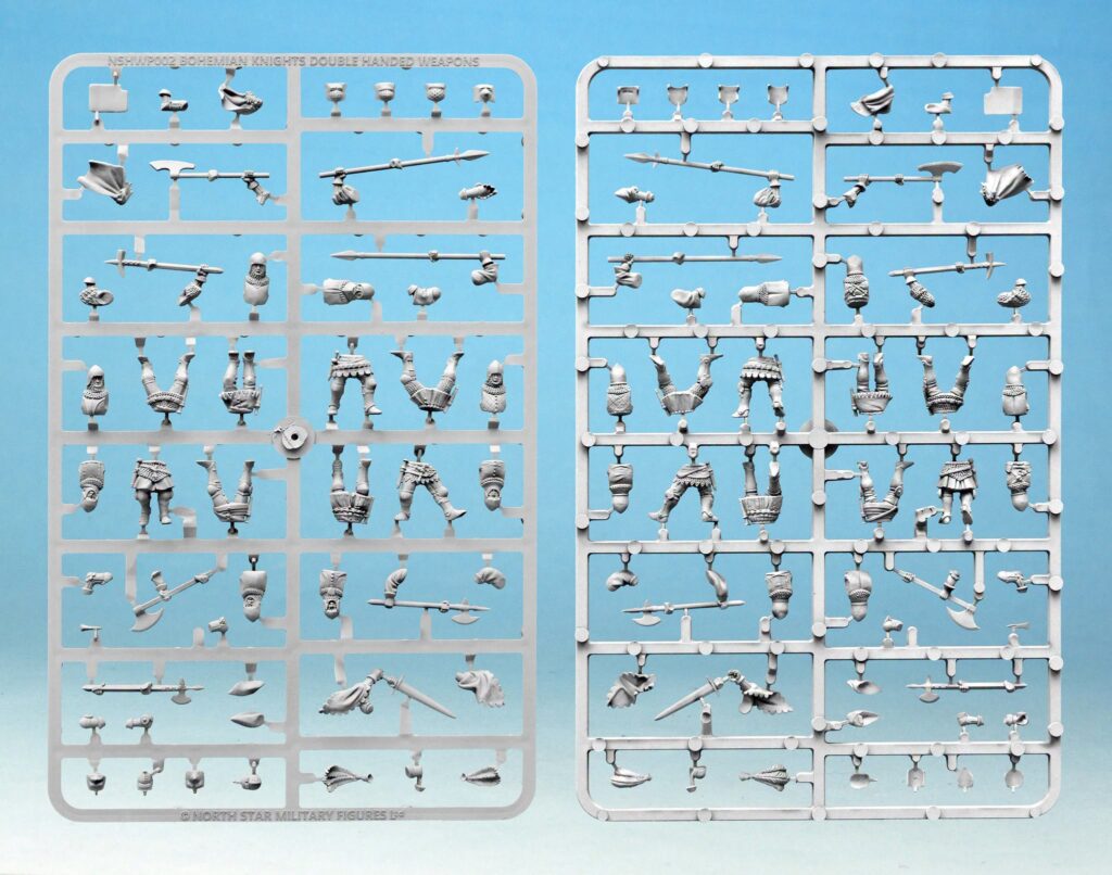 Plastic model kit sprues with knight miniatures and weapons laid on a blue background ready for assembly