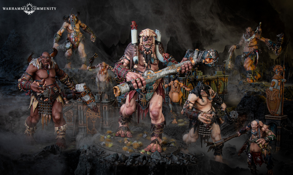 Orc warlords and warriors clash on a smoky battlefield with ruined temples, a Warhammer Community banner in the corner.