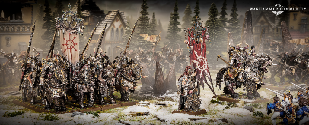 Massed Warhammer miniatures clash on a snowy battlefield, armored knights marching with banners as ruins loom in the background