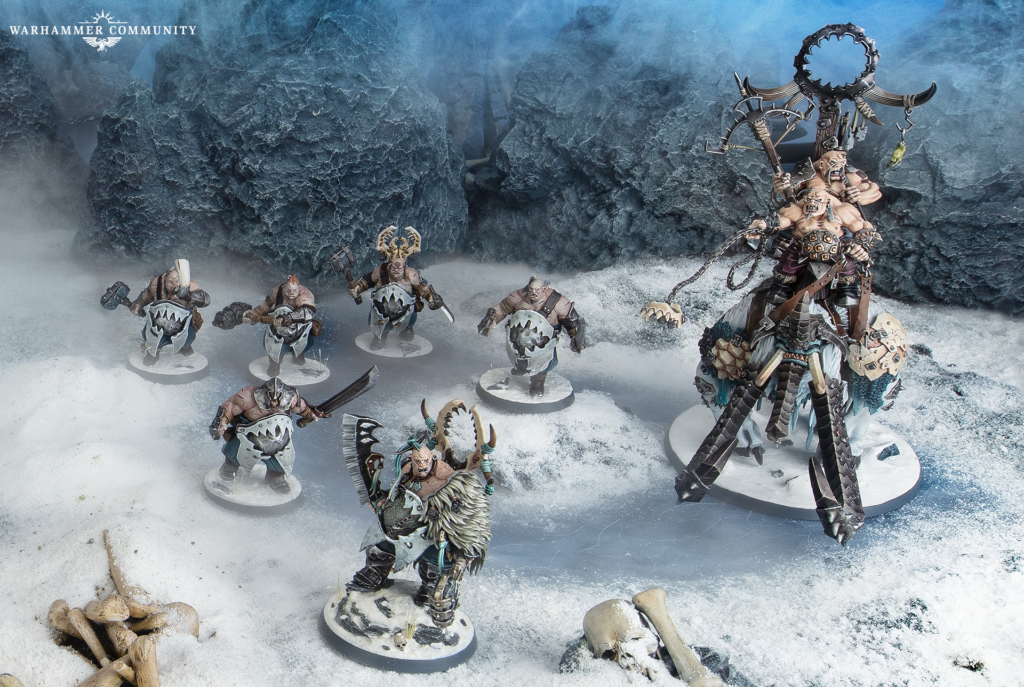 A towering armored orc warboss leads several goblin riders across a snow covered icy battlefield with jagged rocks and scattered bones