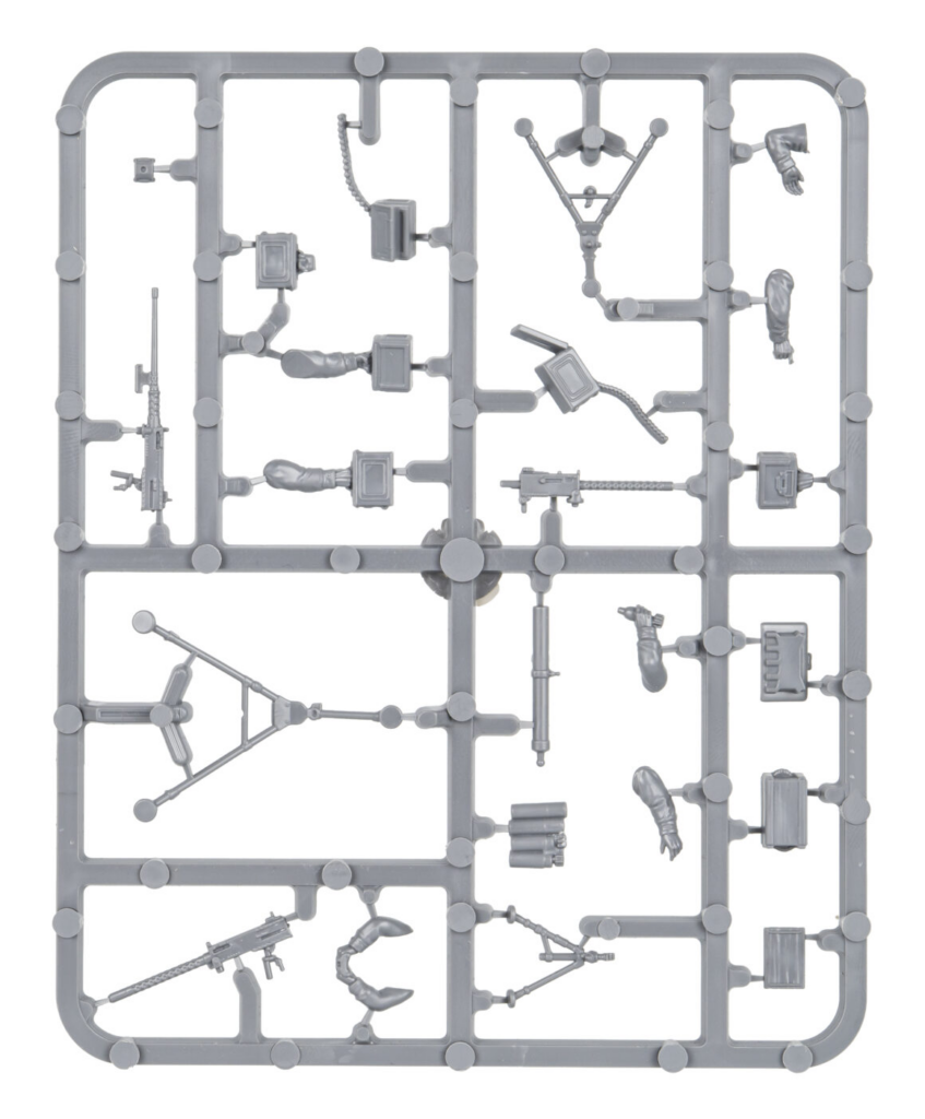 Sprue frame of a grey plastic model kit with rifles hands and gear for an unassembled action figure
