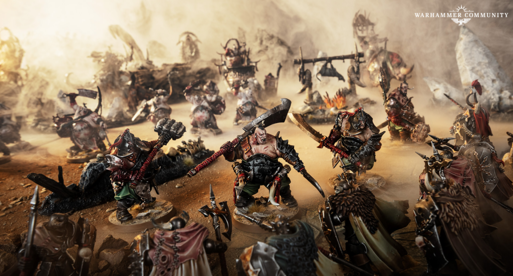 image Frontline Gaming Warhammer battle scene with orc and Chaos miniatures clashing in a dusty battlefield central orc wields a large axe