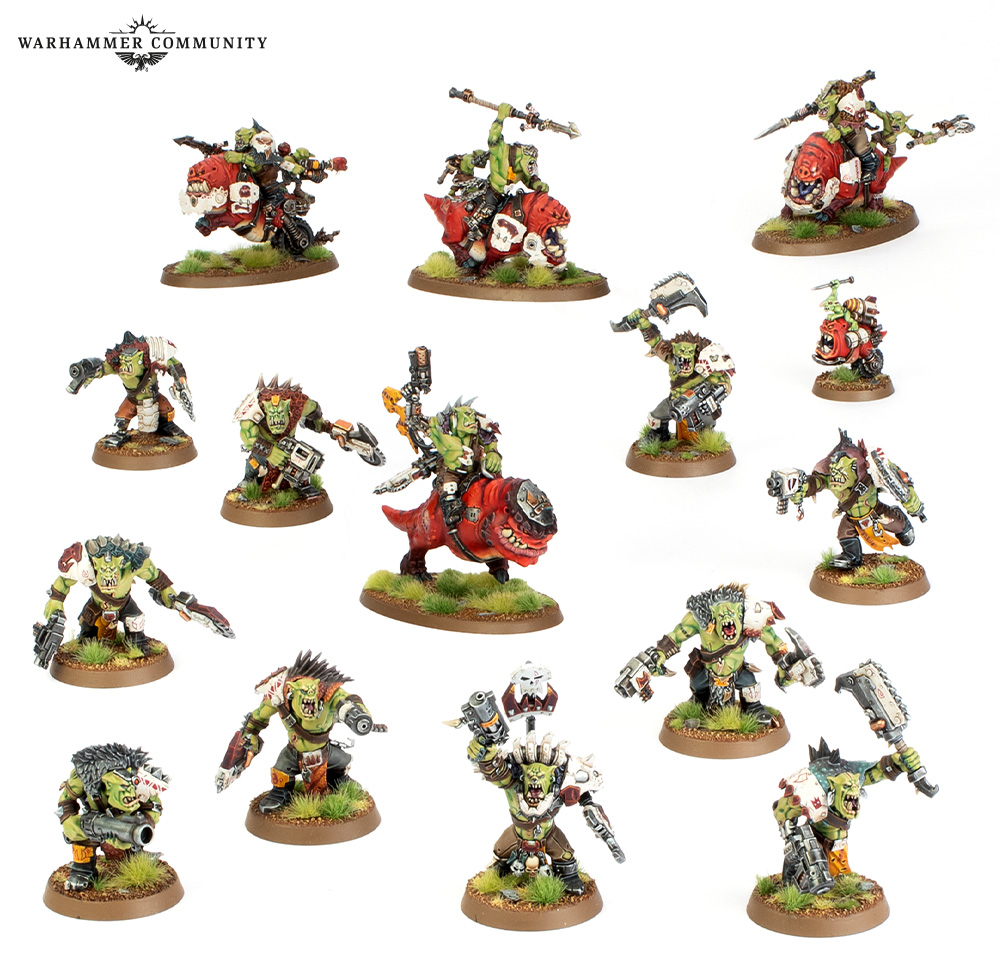image Frontline Gaming Group of painted green orc miniatures in dynamic poses on round bases arranged on a white studio background Warhammer Community