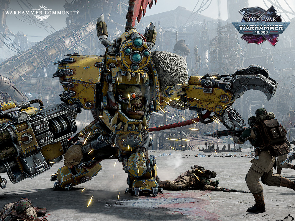 image Frontline Gaming Massive yellow war machine battles a soldier in a ruined industrial battlefield sparks flying as combatants clash Logos for Warhammer Community and Total War Warhammer 40000 appear in the corners