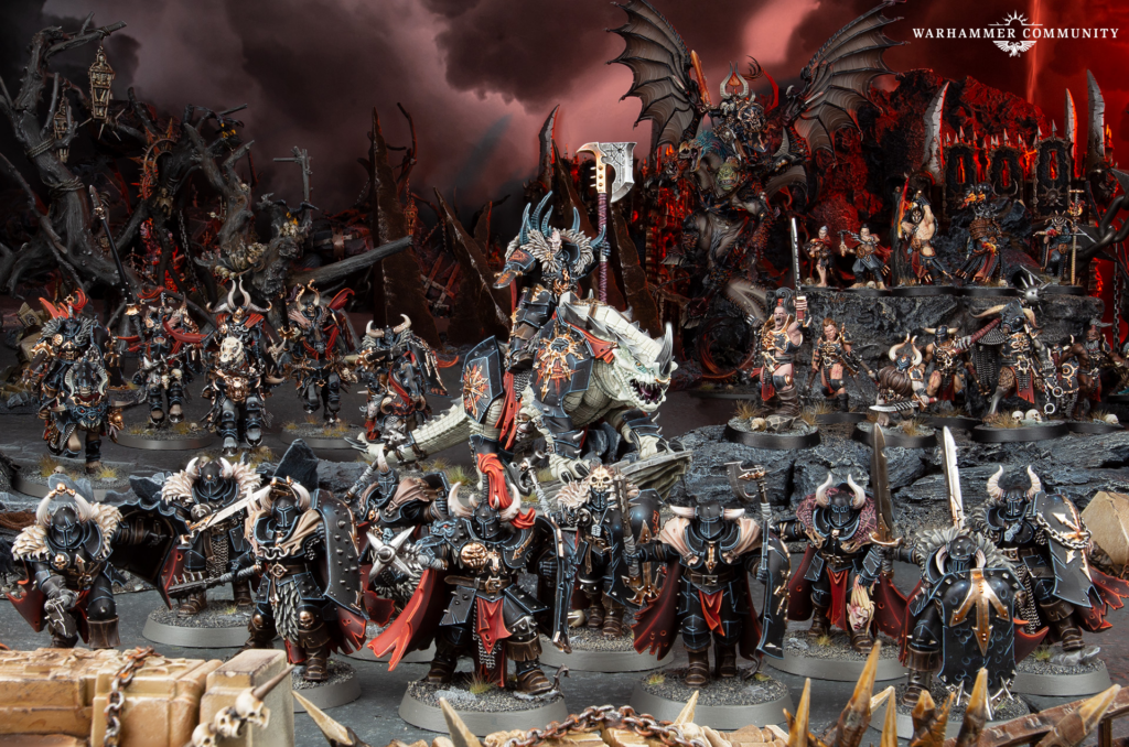 image Frontline Gaming Warhammer fantasy battle diorama showing armored warriors, demons, and a winged dragon amid a lava-lit battlefield.