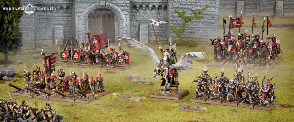 image Frontline Gaming Armored Warhammer miniatures arrayed for battle in front of a stone fortress, with banners and a winged rider centerpiece.