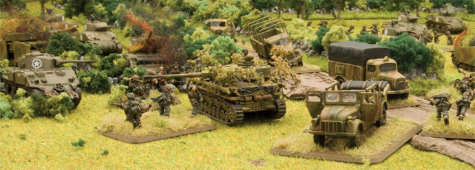 image Frontline Gaming Scale model battlefield with multiple tanks a jeep trucks and infantry miniatures on grassy terrain