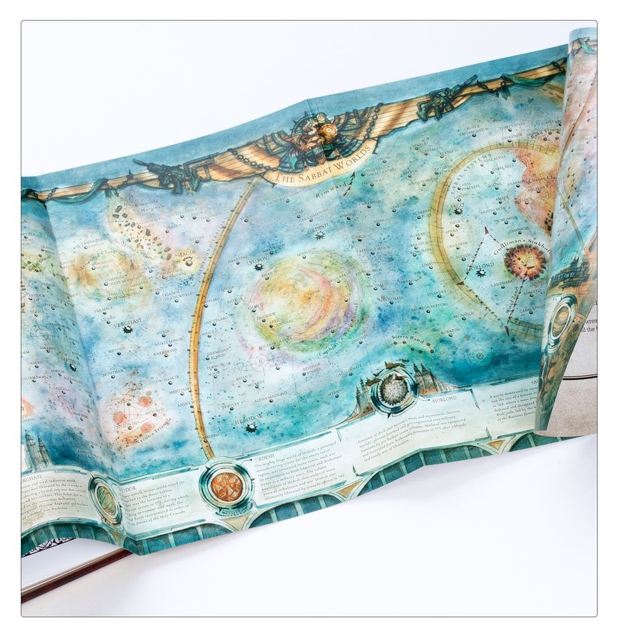 image Frontline Gaming Open illustrated atlas page featuring a colorful space map with planets and star charts