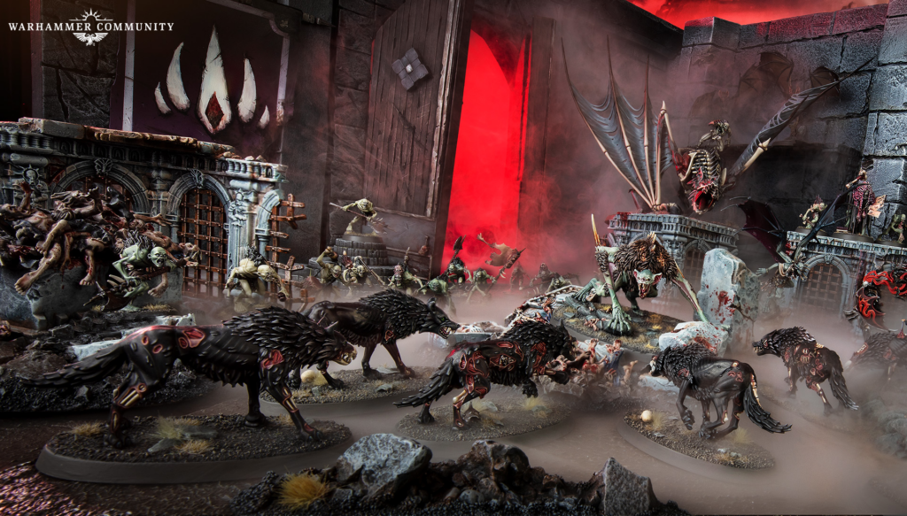 image Frontline Gaming Large fantasy battle scene with grotesque monsters charging through a ruined fortress as a bright red portal glows in the background.