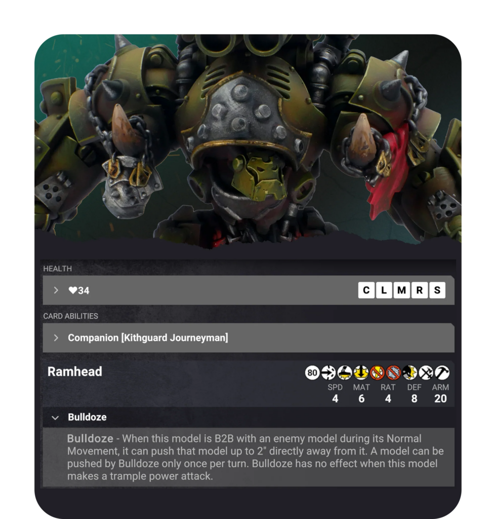 Close-up of a heavily armored green miniature with riveted plates, spikes, and chains from a tabletop game figure.