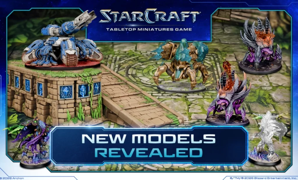 1056640crop Frontline Gaming StarCraft tabletop game promo showing new miniatures on a detailed battlefield with a blue mech on a stone platform and alien figures captioned NEW MODELS REVEALED