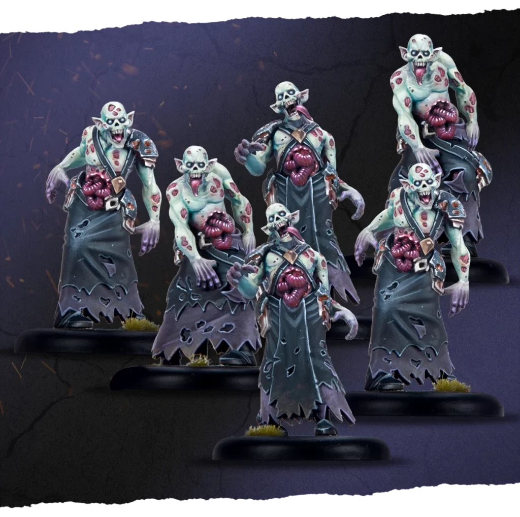 Six zombie like creatures in torn robes with exposed guts standing on round bases tabletop minis