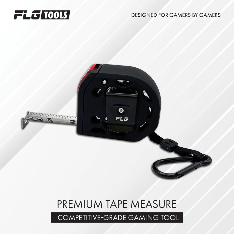 Premium tape measure by FLG Tools with black housing red latch extended metal blade and a hanging carabinergamers compact measuring tool