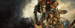 Armored warrior stands beside a towering yellow combat robot amid a smoky battlefield