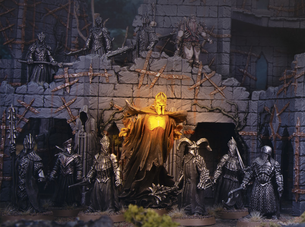 Dark fantasy diorama with armored statues around a ruined stone wall a glowing yellow figure in the center raises its arms illuminated like a beacon among metal clad warriors
