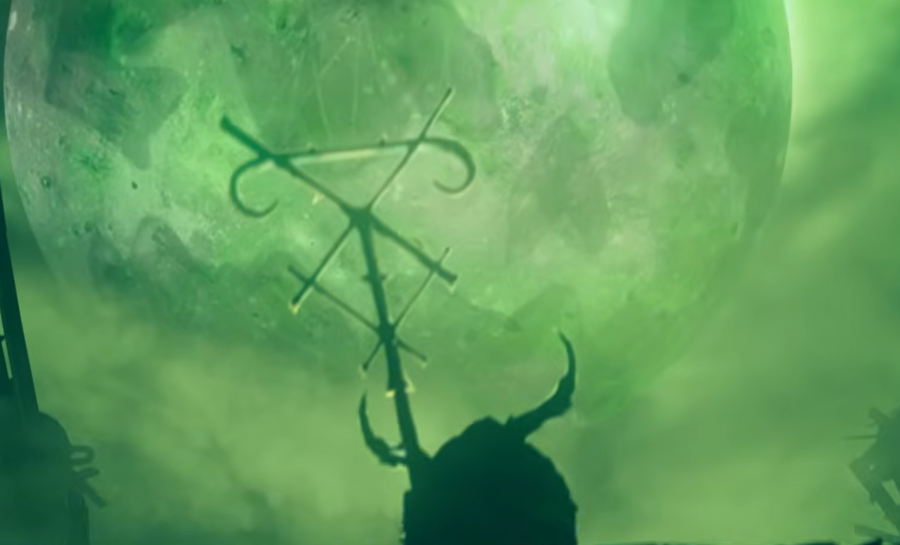 Screenshot 20260813 104558 Frontline Gaming Silhouetted horned figure holds a curved cross shaped staff against a large green moonlit sky