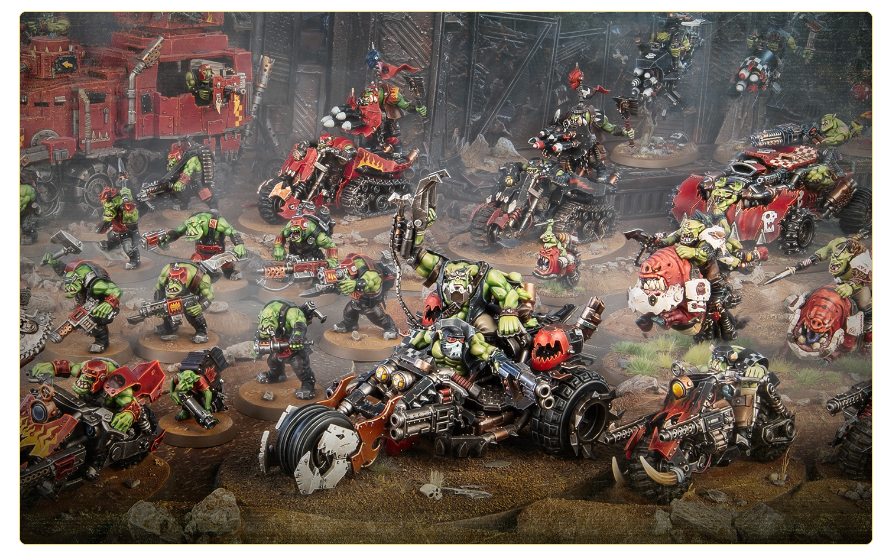 Horde of green orc miniatures in a chaotic battle with armored vehicles on a dusty war torn terrain
