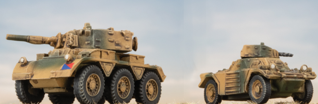 Screenshot 20260827 083129 Frontline Gaming Two desert camo toy tanks facing left on a sandy surface