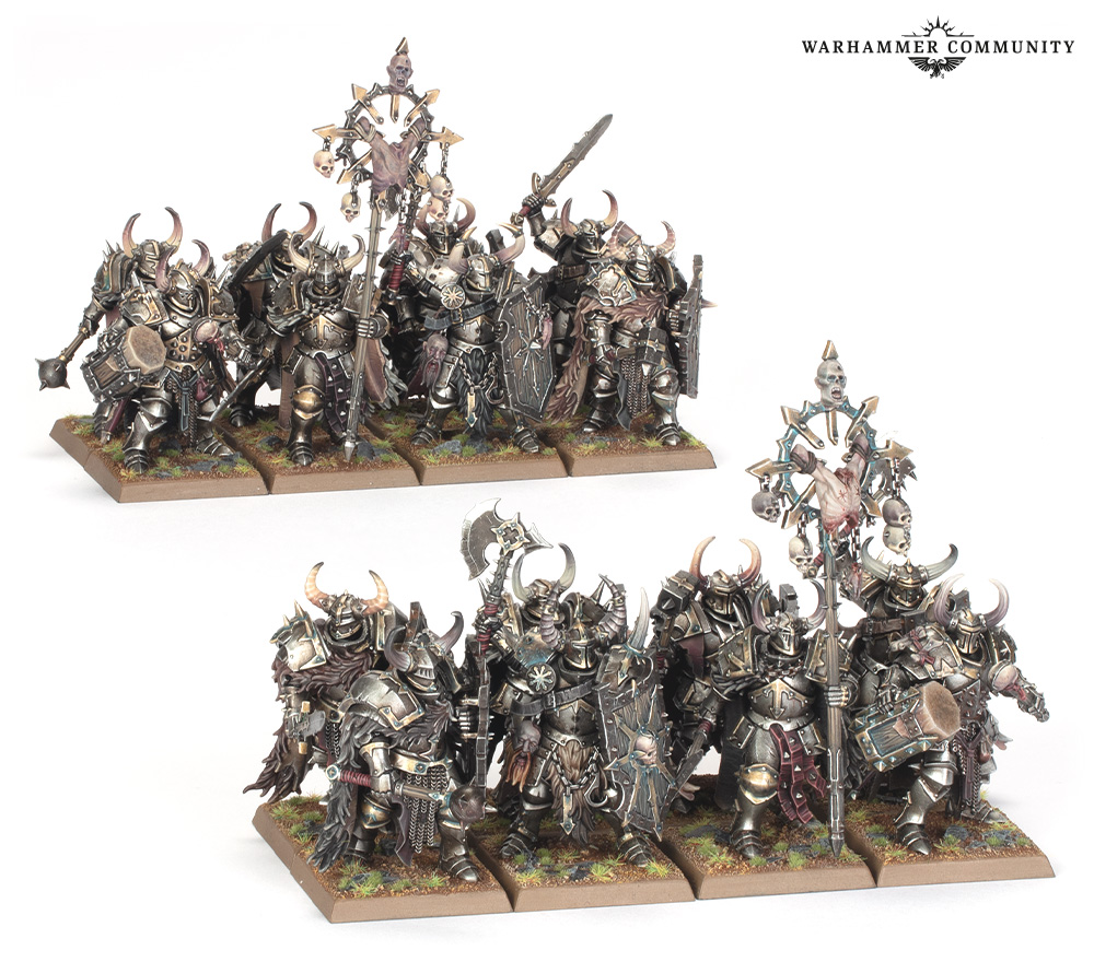 image Frontline Gaming Group of Chaos Warriors in ornate silver armor with horns standing in two ranks on grassy bases for a Warhammer army display