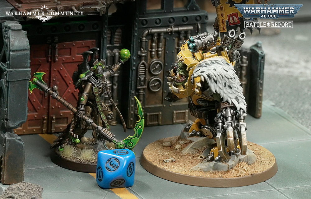 image Frontline Gaming Two Warhammer miniatures confront each other near a ruined wall with a blue dice on the ground and a sandy base beneath the right figure