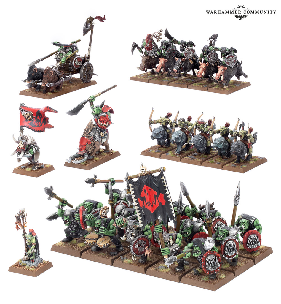Warhammer Orc miniatures set on bases chariot infantry blocks boar riders and a large bannered shield wall for tabletop battle